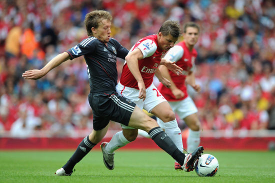 国足热身赛战胜对手士气大增（国足热身赛告捷，士气高涨）